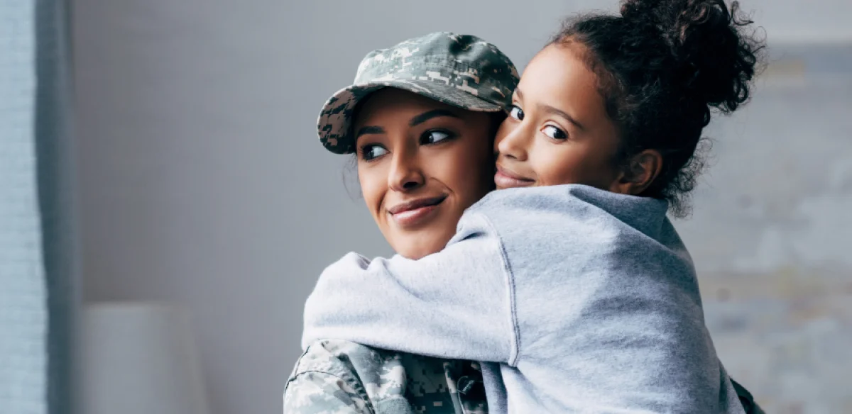 Mother and daughter hugging